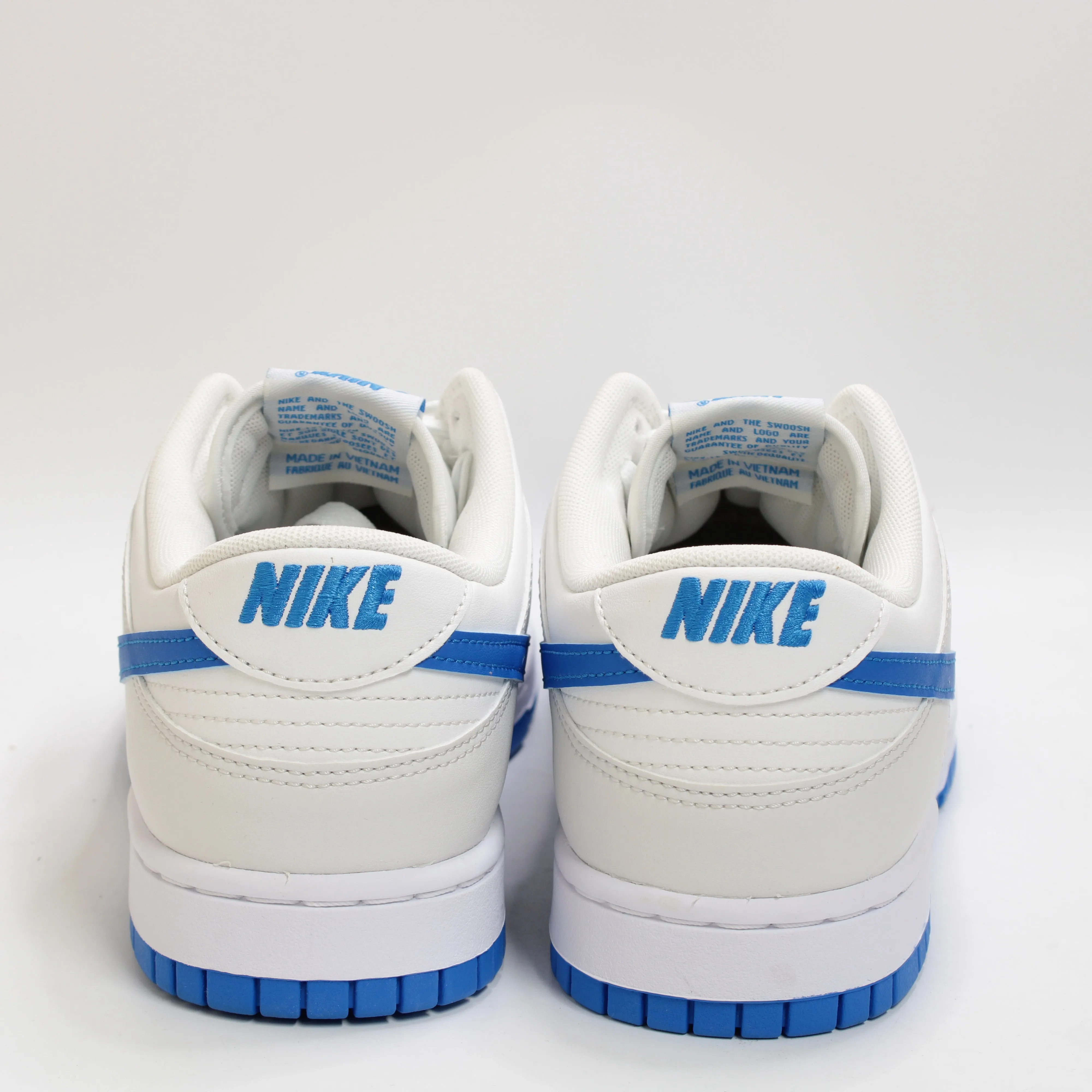 Nike Dunk Low Trainers Summit White Photo Blue Platinum Tin