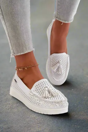 White eco leather women’s moccasin’s.